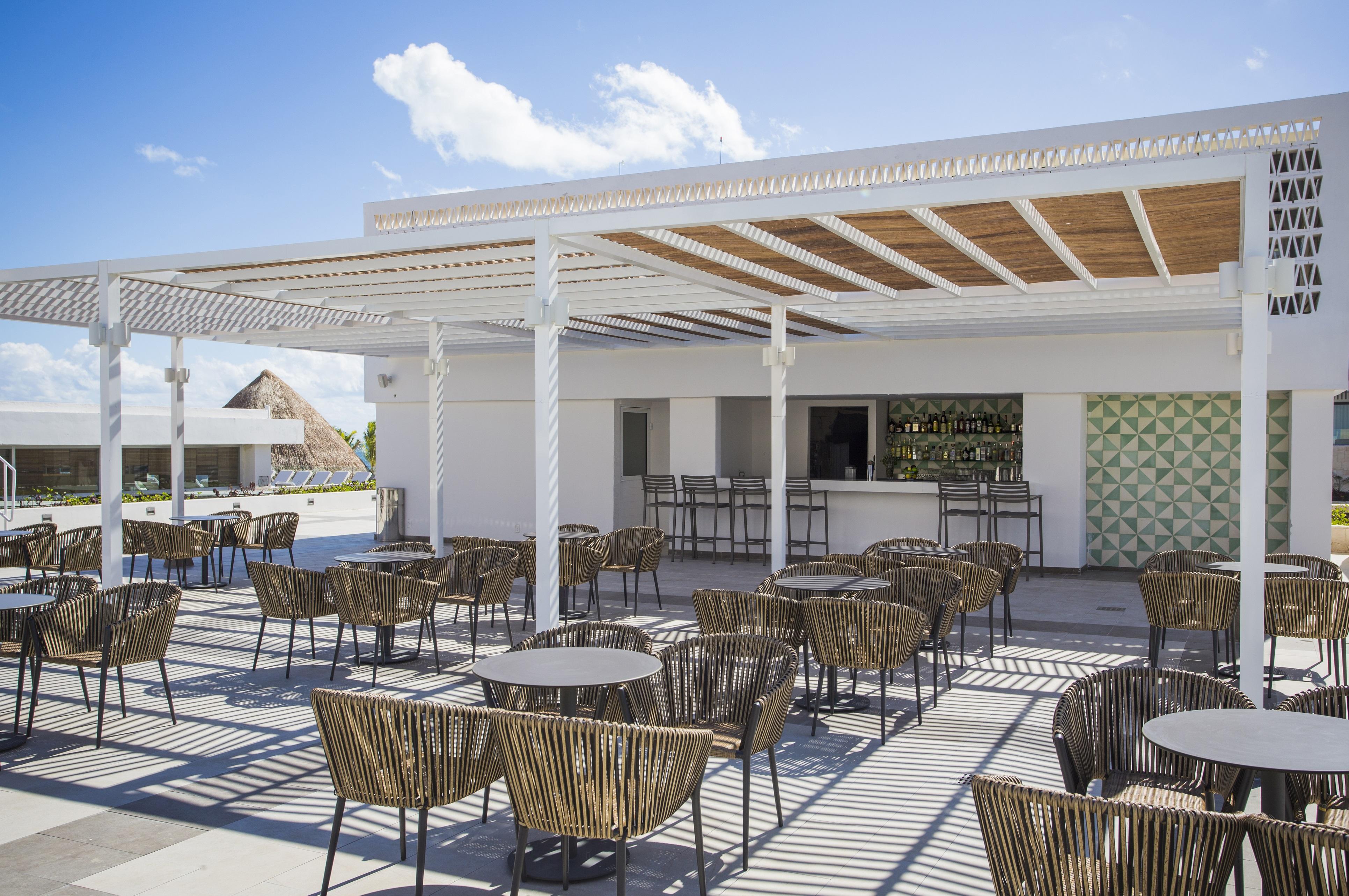 Majestic Elegance Costa Mujeres (Adults Only) Hotel Cancun Exterior photo Rooftop bar at the Grand Palladium Hotel